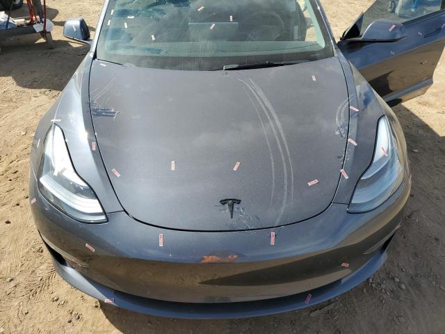 Photo 11 from auction – 2022 TESLA MODEL 3 with VIN 5YJ3E1EB1NF198403