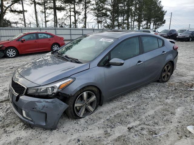 KIA FORTE LX 2018 with VIN 3KPFL4A70JE249895 - Photo from auction