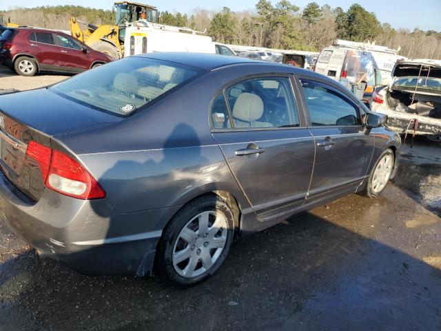 Photo 3 from auction – 2011 HONDA CIVIC LX with VIN 19XFA1F50BE049242
