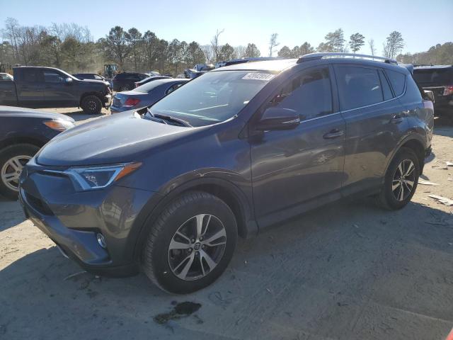 TOYOTA RAV4 XLE 2016 with VIN JTMRFREVXGD177026 - Photo from auction