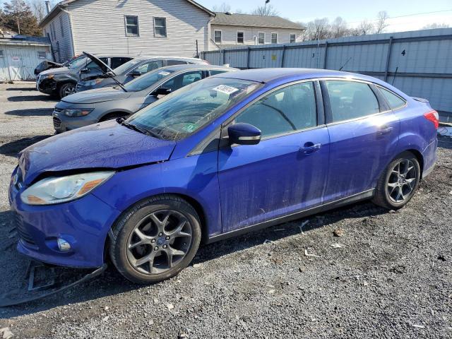 FORD FOCUS SE 2014 with VIN 1FADP3F24EL344465 - Photo from auction