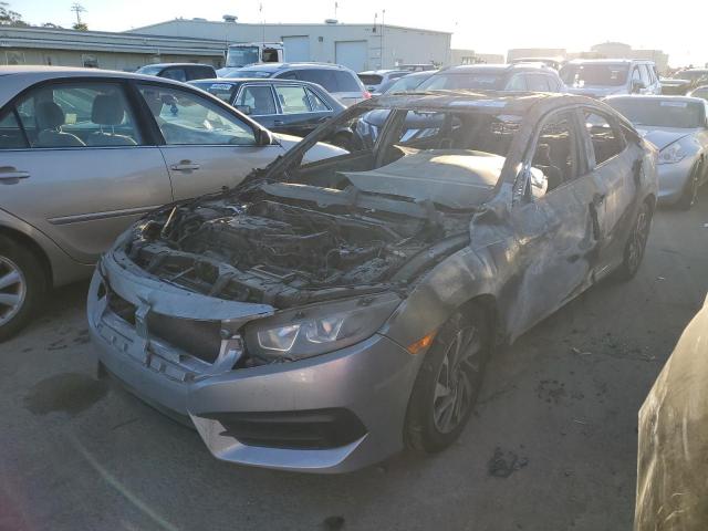 HONDA CIVIC EX 2018 with VIN 19XFC2F7XJE204704 - Photo from auction