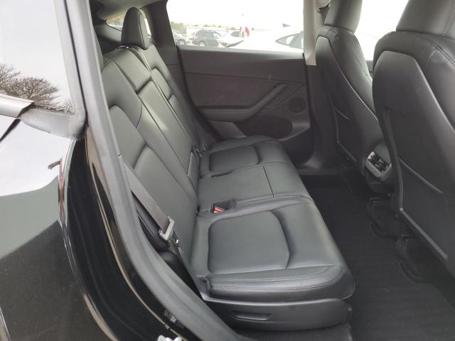 Photo 11 from auction – 2023 TESLA MODEL Y with VIN 7SAYGAEE9PF919843