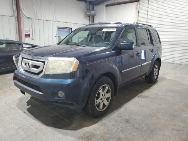 HONDA PILOT TOUR 2009 with VIN 5FNYF38919B001808 - Photo from auction