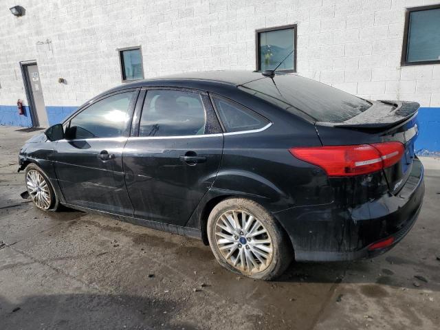 Photo 2 from auction – 2015 FORD FOCUS TITA with VIN 1FADP3J22FL358163