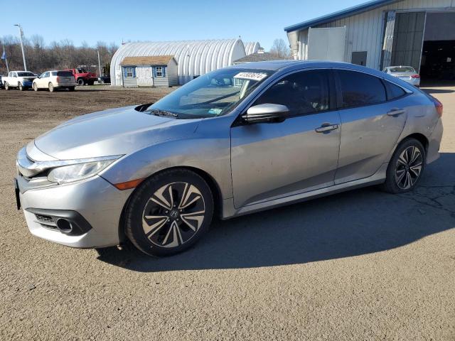 HONDA CIVIC EXL 2017 with VIN 19XFC1F74HE200412 - Photo from auction