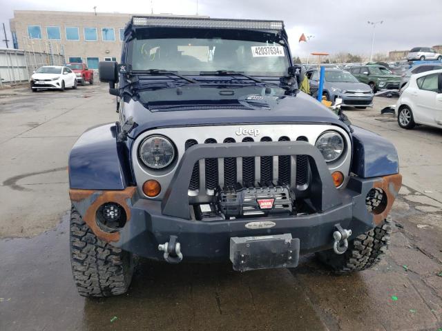 Photo 5 from auction – 2013 JEEP WRANGLER U with VIN 1C4BJWDG6DL591018