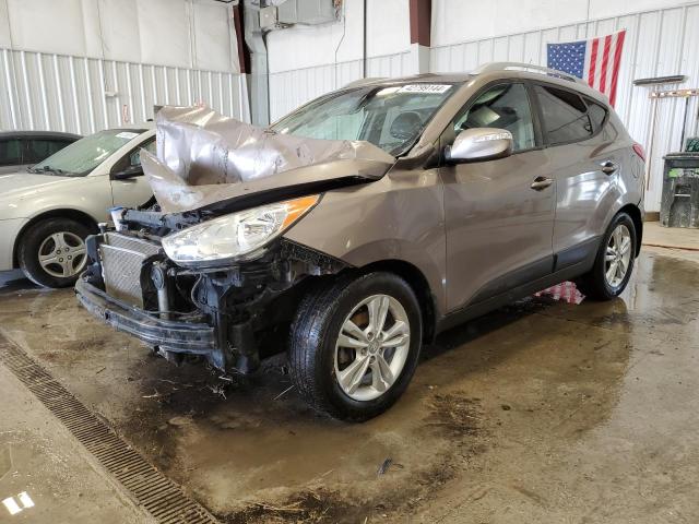 HYUNDAI TUCSON GLS 2012 with VIN KM8JUCAC5CU402897 - Photo from auction