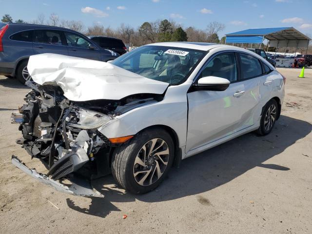 HONDA CIVIC EX 2017 with VIN 19XFC2F70HE055648 - Photo from auction