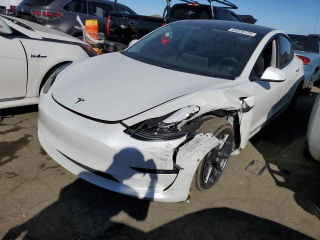 TESLA MODEL 3 2021 with VIN 5YJ3E1EBXMF879660 - Photo from auction