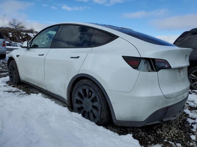 Photo 2 from auction – 2021 TESLA MODEL Y with VIN 5YJYGDED6MF103724