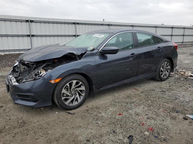 HONDA CIVIC EX 2018 with VIN 2HGFC2F77JH603091 - Photo from auction