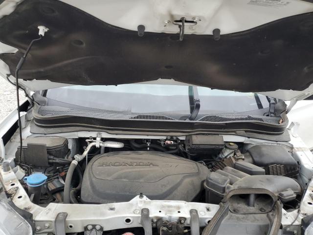 Photo 12 from auction – 2021 HONDA PILOT TOUR with VIN 5FNYF5H69MB013313