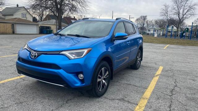 Photo 2 from auction – 2016 TOYOTA RAV4 XLE with VIN JTMRFREV7GJ102110