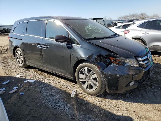 Photo 4 from auction – 2014 HONDA ODYSSEY TO with VIN 5FNRL5H97EB028658