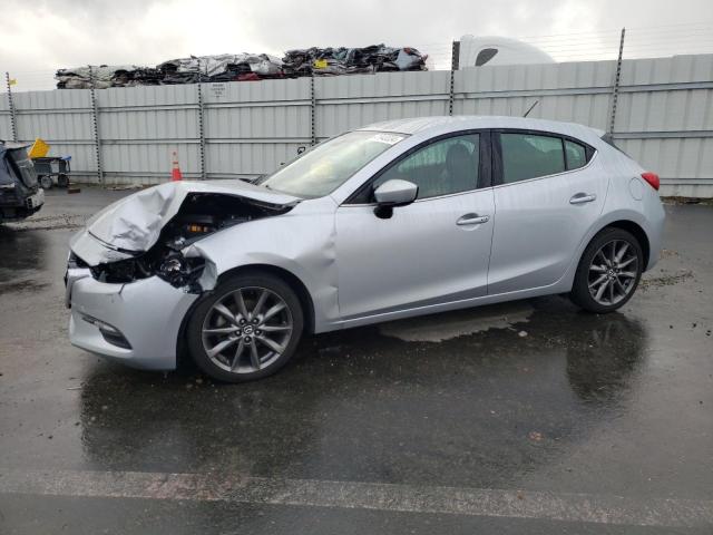 MAZDA 3 TOURING 2018 with VIN 3MZBN1L32JM275953 - Photo from auction