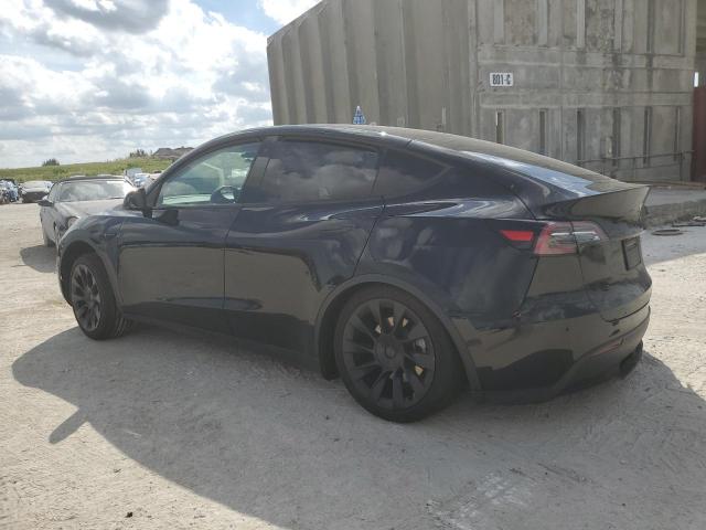 Photo 2 from auction – 2023 TESLA MODEL Y with VIN 7SAYGAEE7PF707734