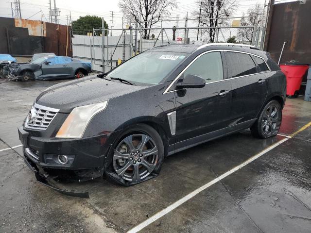 CADILLAC SRX PERFOR 2013 with VIN 3GYFNDE32DS551786 - Photo from auction