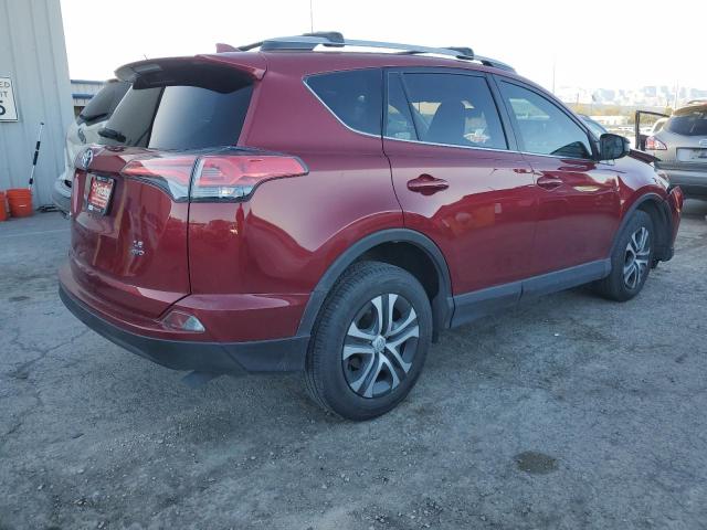 Photo 3 from auction – 2018 TOYOTA RAV4 LE with VIN JTMBFREV2JD241990
