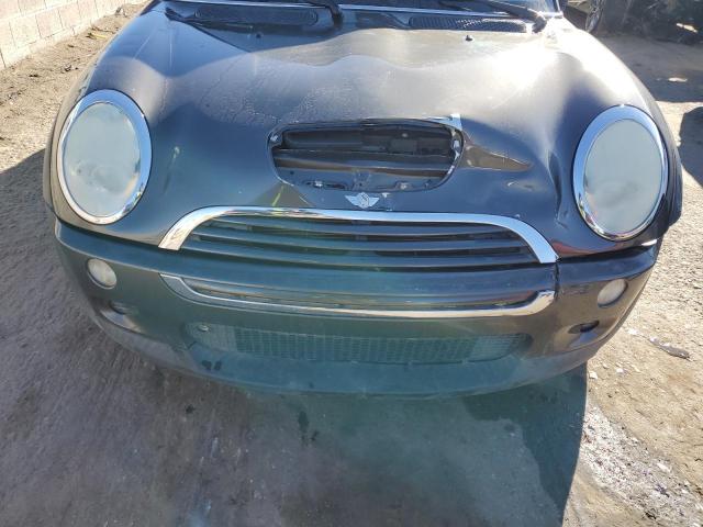 Photo 11 from auction – 2006 MINI COOPER S with VIN WMWRE33546TJ34581