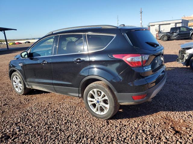 Photo 2 from auction – 2017 FORD ESCAPE SE with VIN 1FMCU9GD1HUC52029