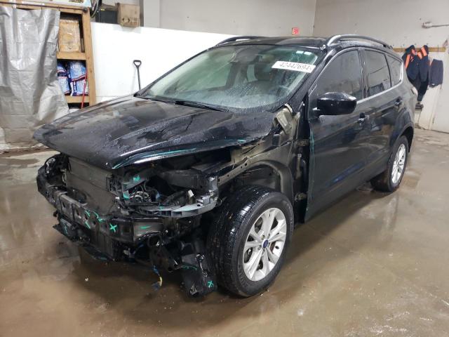 FORD ESCAPE SE 2018 with VIN 1FMCU9GD9JUA75347 - Photo from auction