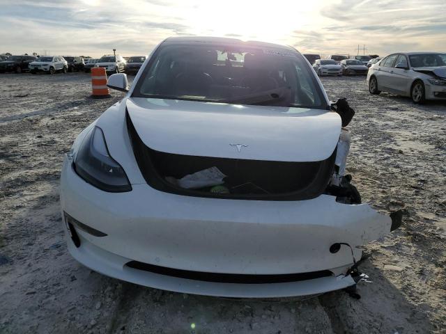 Photo 5 from auction – 2021 TESLA MODEL 3 with VIN 5YJ3E1EB6MF034854