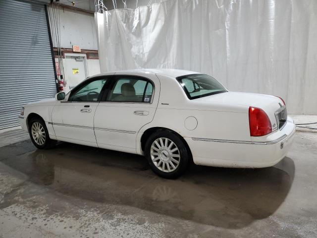 Photo 2 from auction – 2004 LINCOLN TOWN CAR E with VIN 1LNHM81W94Y683540