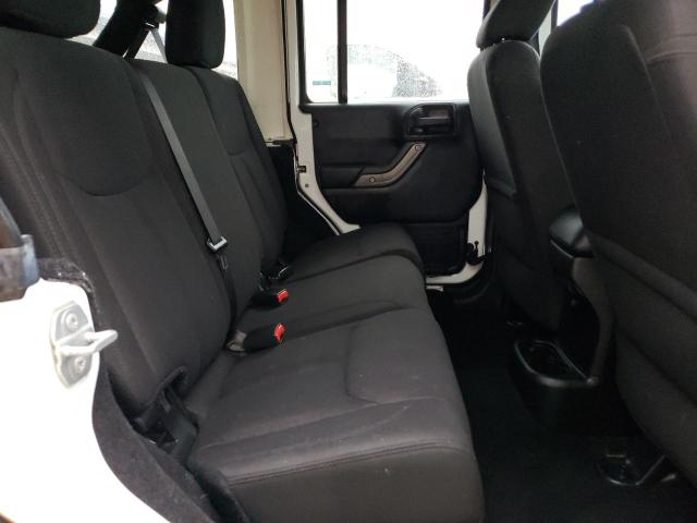 Photo 11 from auction – 2015 JEEP WRANGLER U with VIN 1C4BJWDG9FL691925