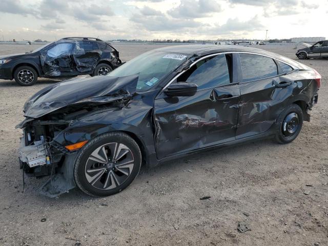 HONDA CIVIC EX 2017 with VIN 19XFC1F31HE012797 - Photo from auction