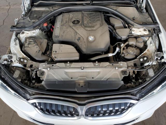 Photo 11 from auction – 2023 BMW 330I with VIN 3MW69FF04P8D50996