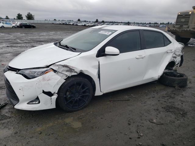 TOYOTA COROLLA L 2018 with VIN 5YFBURHE5JP793031 - Photo from auction