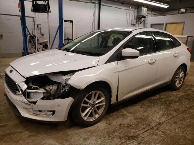 FORD FOCUS SE 2018 with VIN 1FADP3F21JL225332 - Photo from auction