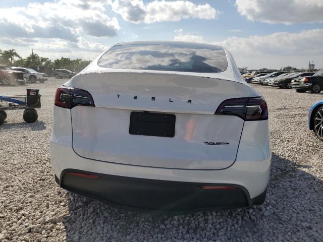 Photo 6 from auction – 2023 TESLA MODEL Y with VIN 7SAYGAEE9PF901908