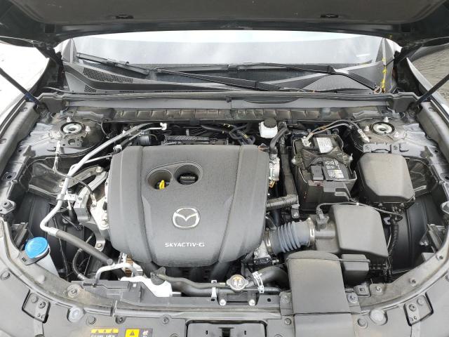 Photo 12 from auction – 2023 MAZDA CX-50 PREM with VIN 7MMVABEMXPN131265