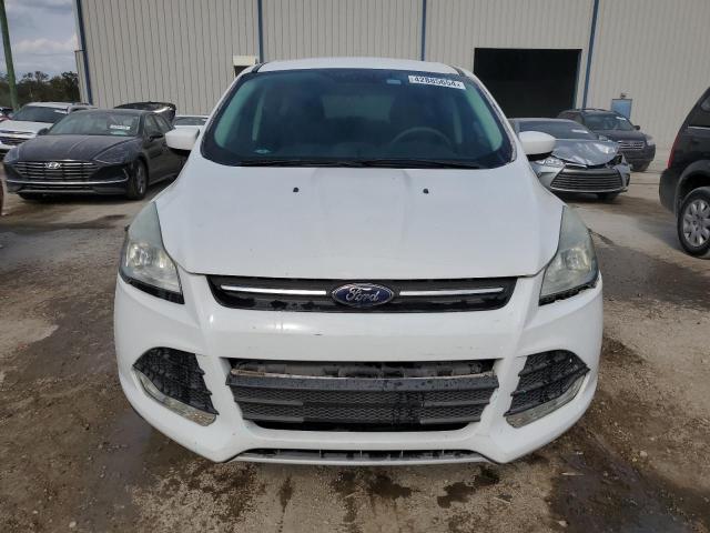 Foto 5 de la subasta – 2016 FORD ESCAPE SE con VIN 1FMCU0G7XGUA35552