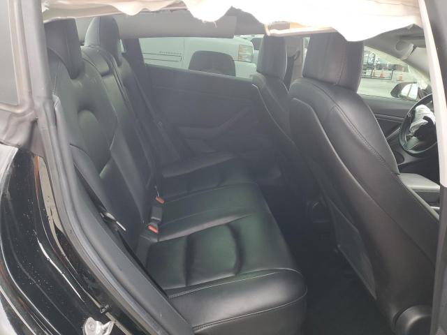 Photo 10 from auction – 2019 TESLA MODEL 3 with VIN 5YJ3E1EA7KF409753