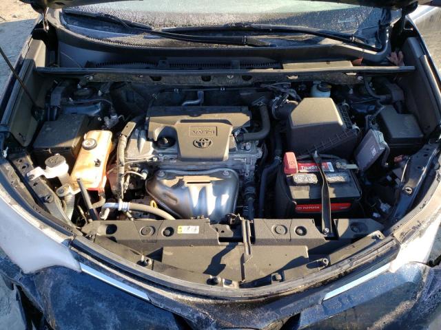 Photo 12 from auction – 2018 TOYOTA RAV4 LE with VIN JTMBFREV0JJ738215