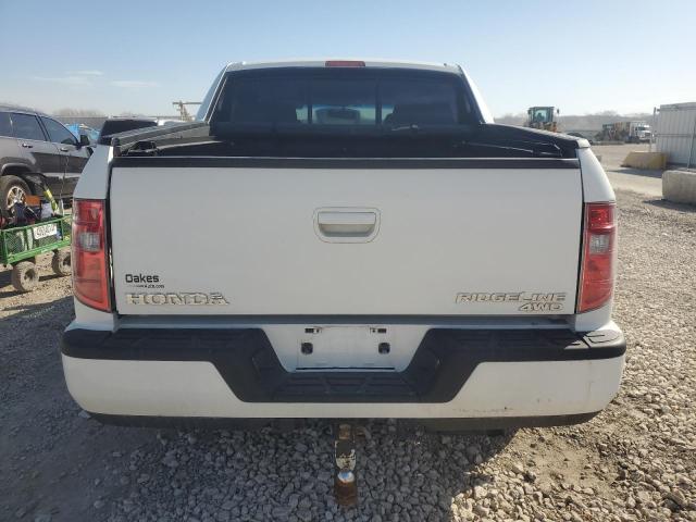 Photo 6 from auction – 2011 HONDA RIDGELINE with VIN 5FPYK1F51BB004446