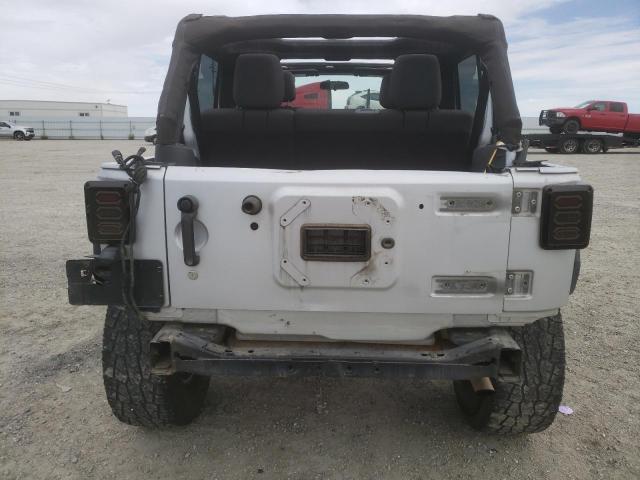 Photo 6 from auction – 2012 JEEP WRANGLER U with VIN 1C4BJWDG8CL214804