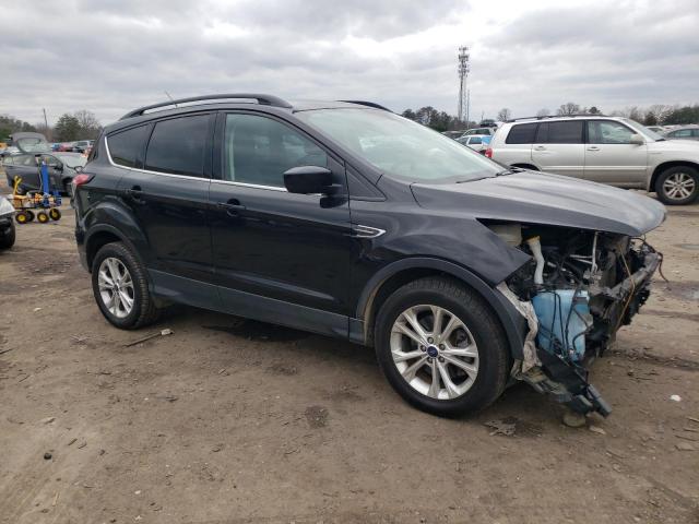 Photo 4 from auction – 2018 FORD ESCAPE SE with VIN 1FMCU9GD4JUA10938