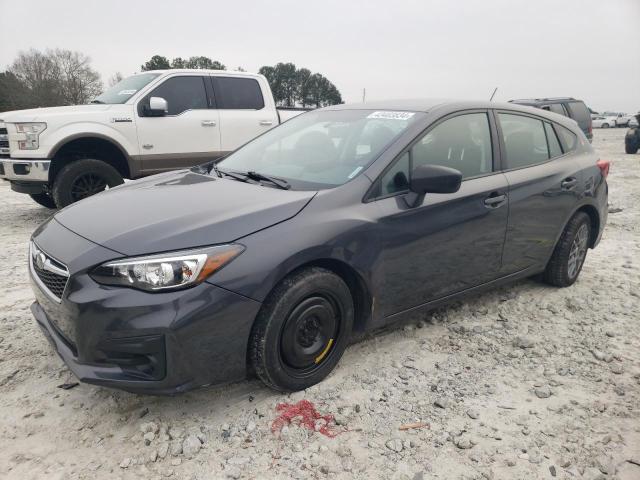 SUBARU IMPREZA 2019 with VIN 4S3GTAA60K3744889 - Photo from auction