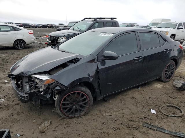 TOYOTA COROLLA L 2015 with VIN 2T1BURHE4FC299945 - Photo from auction
