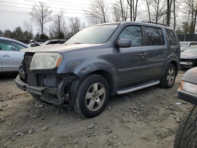 HONDA PILOT EXLN 2011 with VIN 5FNYF4H70BB060231 - Photo from auction