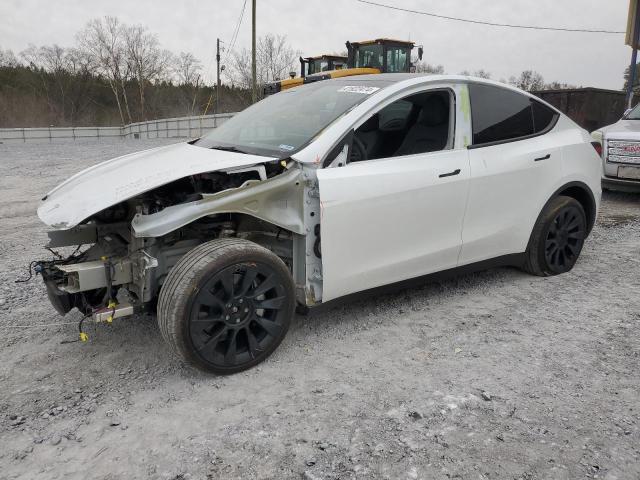 TESLA MODEL Y 2023 with VIN 7SAYGDEE4PA059512 - Photo from auction