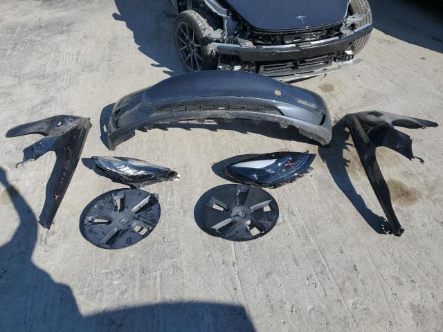 Photo 12 from auction – 2023 TESLA MODEL 3 with VIN 5YJ3E1EA4PF414044