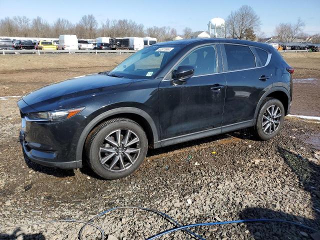 MAZDA CX-5 TOURI 2018 with VIN JM3KFBCM7J0410353 - Photo from auction