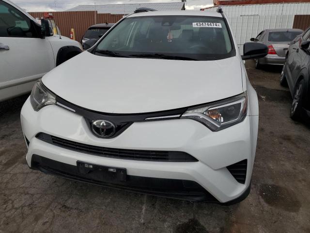 Photo 5 from auction – 2017 TOYOTA RAV4 LE with VIN JTMZFREV0HJ104427