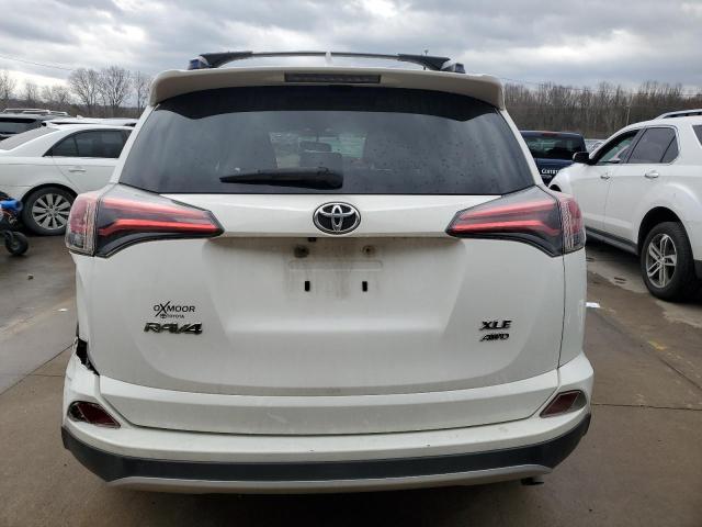 Photo 6 from auction – 2016 TOYOTA RAV4 XLE with VIN JTMRFREV9GJ057011