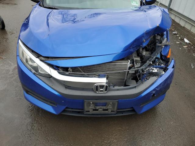 Photo 11 from auction – 2016 HONDA CIVIC LX with VIN 19XFC2F58GE237143